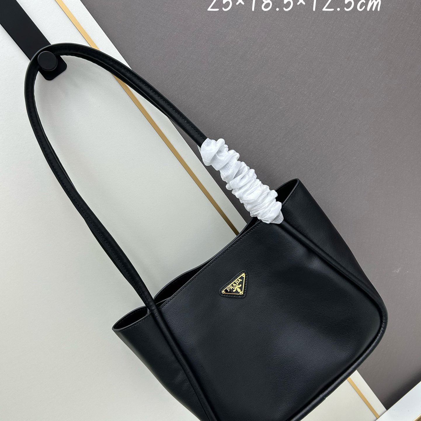 Pra*a top handle bags